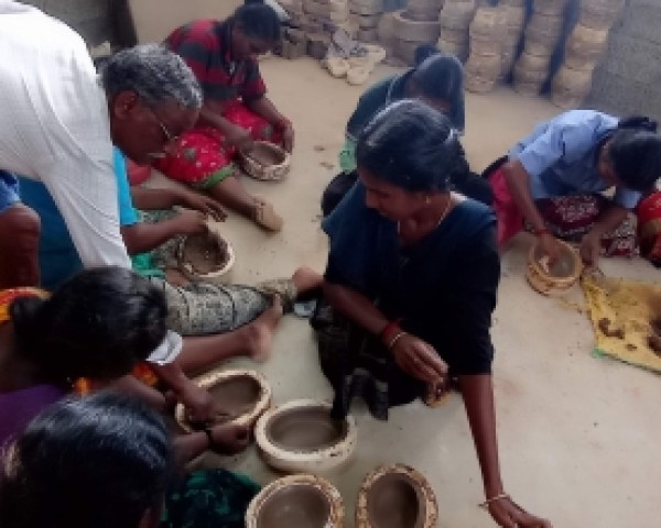 status improvement of s c people through skill up gradation training by adopting innovative pottery production technology